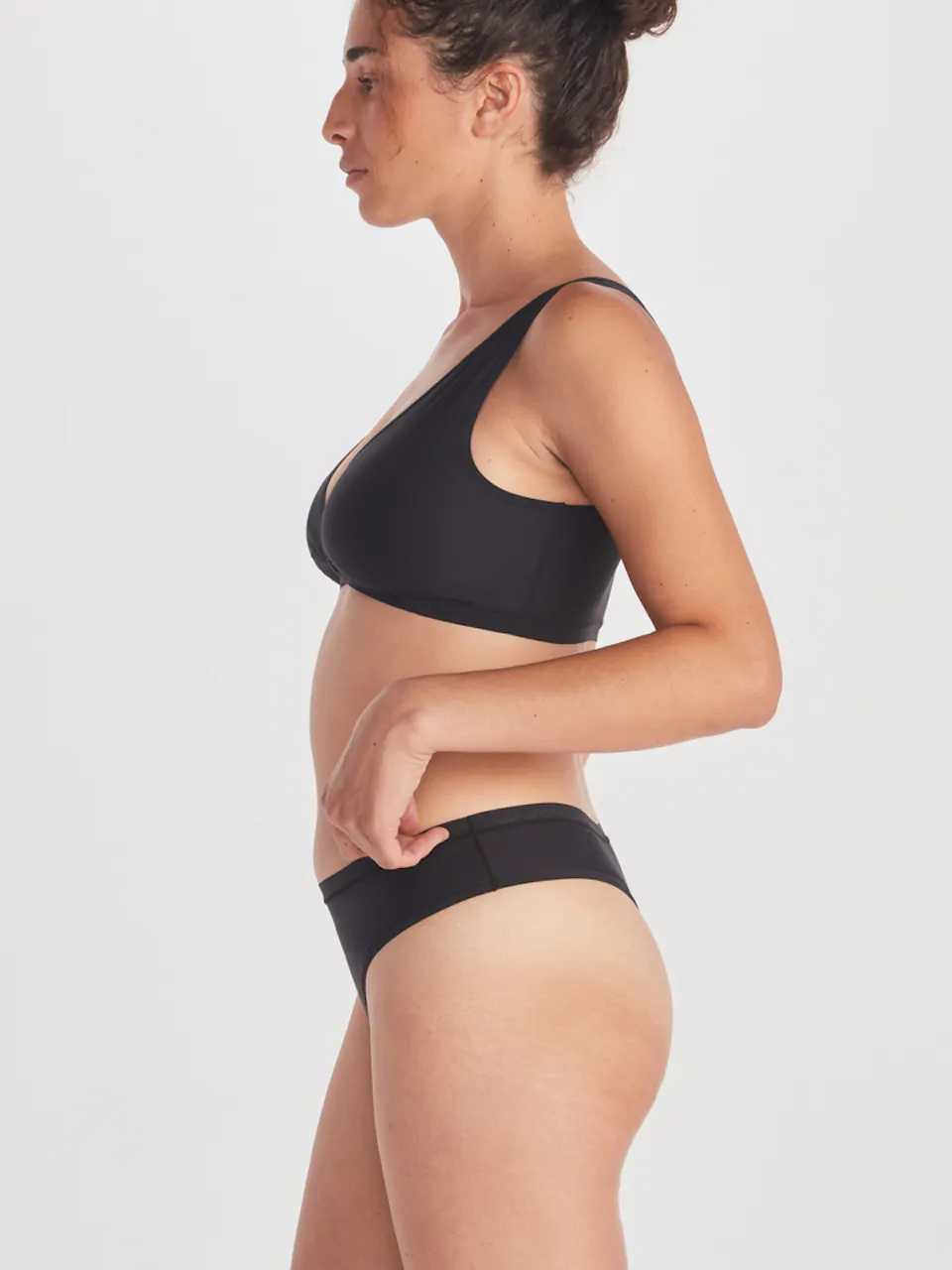 side of women's brief underwear on model