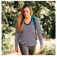 woman wearing striped long-sleeve shirt