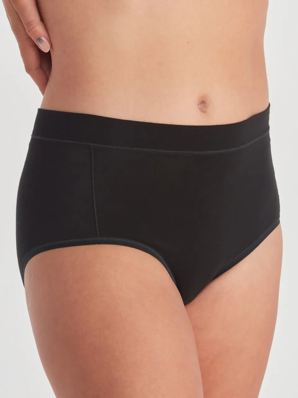 front of women's high waisted brief on model