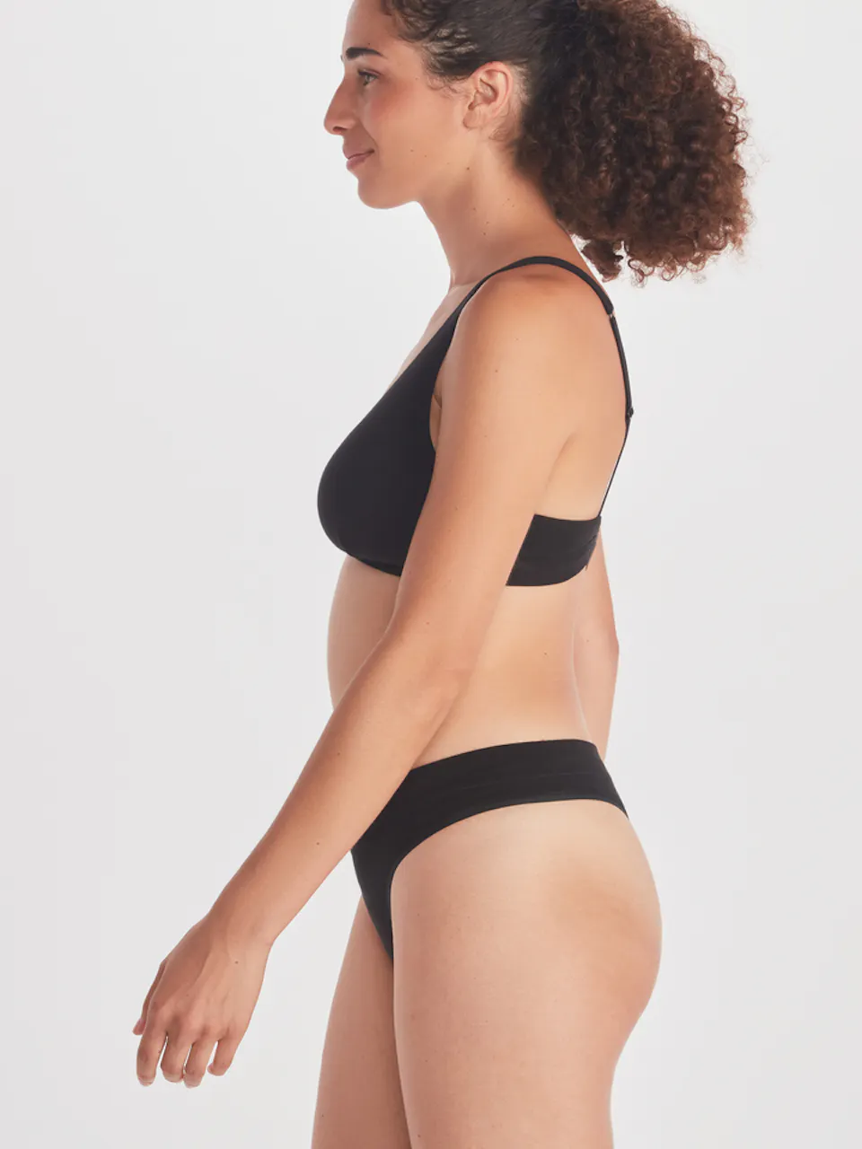 side of women's brief and bra on model