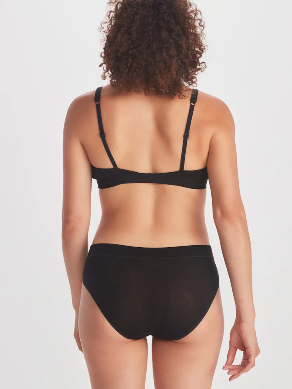 back of women's bra and panty set on model