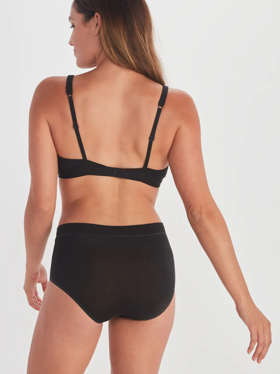 back of women's bra and panty set on model